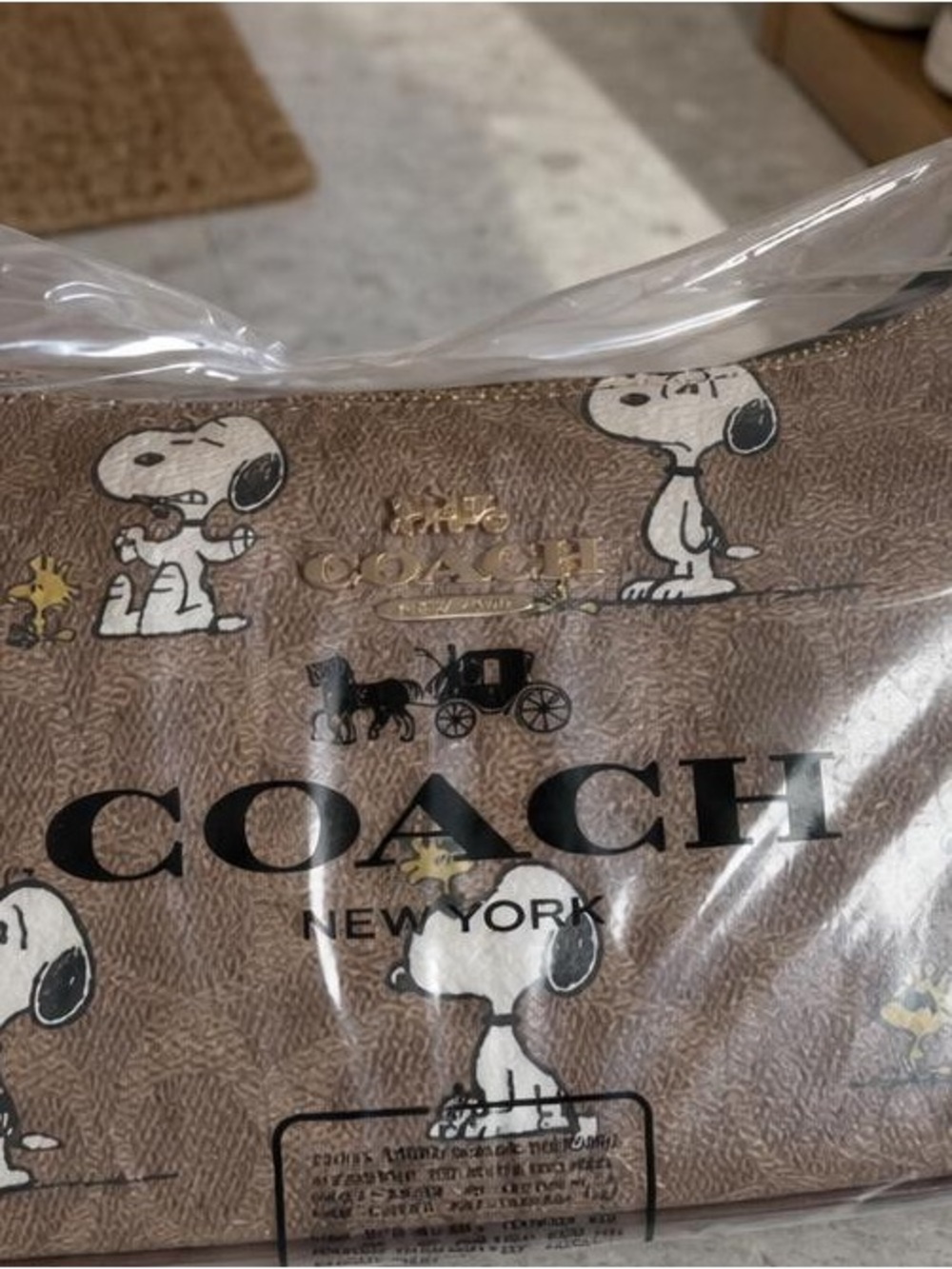 Coach Brown Snoopy Printed Wristlet with Gold Hardware - Picture 4 of 7